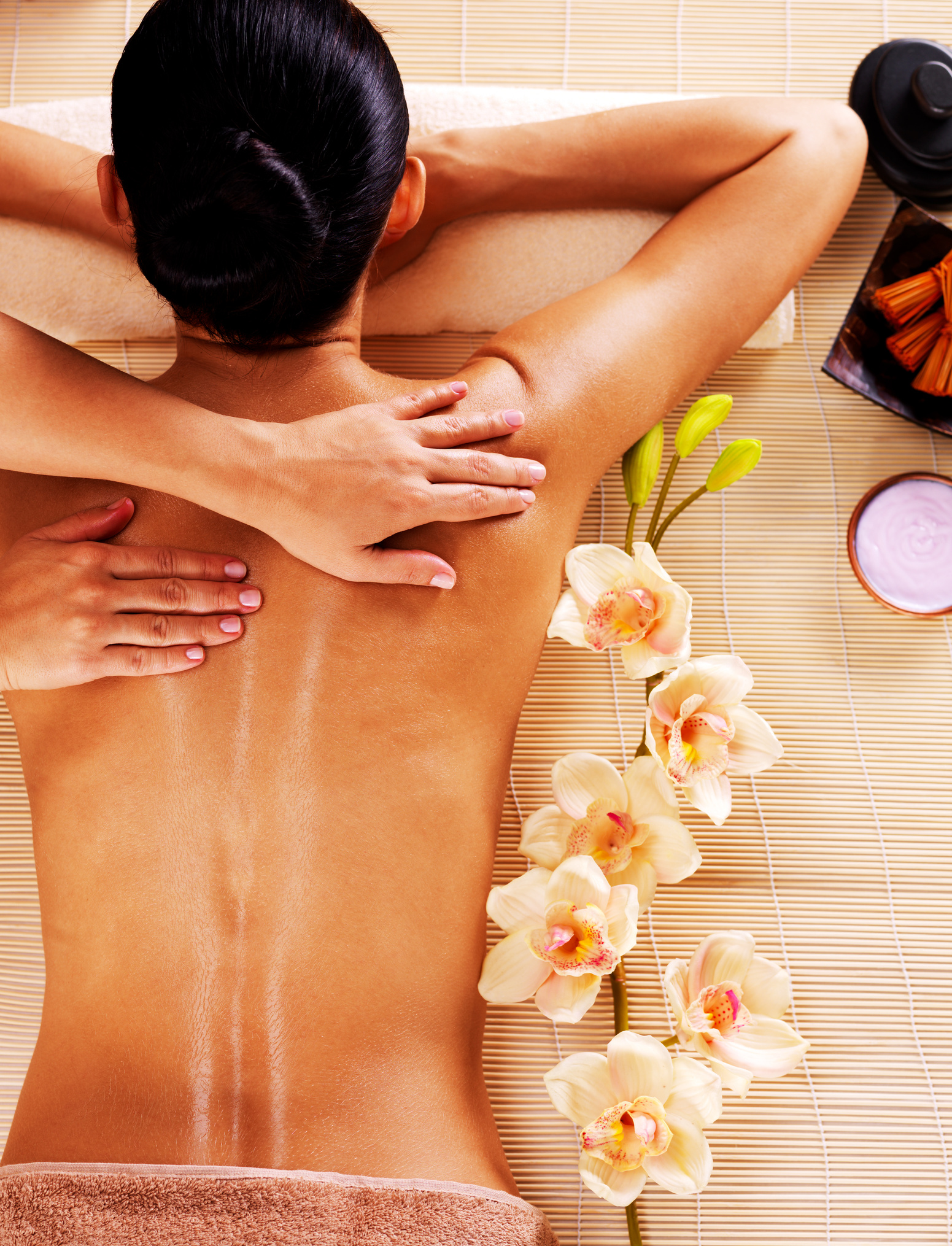 Adult Woman in Spa Salon Having Body Massage.